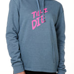 A female model wearing a BLUE hoodie with the text 'TILL I DIE' printed in pink on the front.