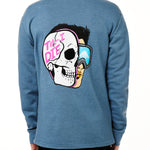 MALE MODEL WEARING A BLUE HOODIE WITH THE HOOD UP, FEATURING A GRAPHIC OF A CARTOON HALF SKELETON HALF SKIER HEAD WITH THE WORDS 'TILL I DIE'