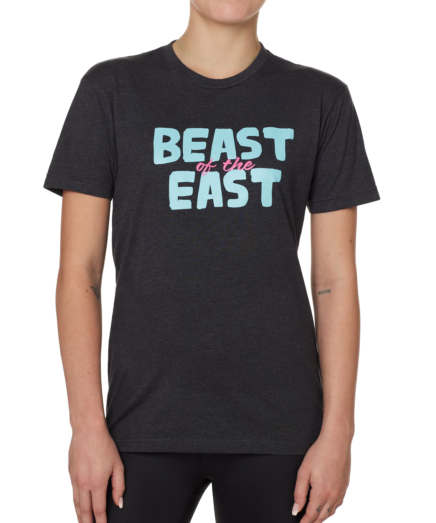 FEMALE MODEL WEARING A HEATHER GRAY TEE SHIRT WITH THE WORDS "BEAST OF THE EAST" IN BLUE AND PINK