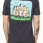 BACK OF A MALE MODEL WEARING A HEATHER GRAY TEE SHIRT WITH A GRAPHIC OF A MOUNTAIN AND THE WORDS TILL I DIE