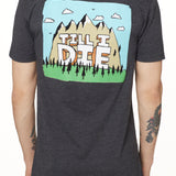 BACK OF A MALE MODEL WEARING A HEATHER GRAY TEE SHIRT WITH A GRAPHIC OF A MOUNTAIN AND THE WORDS TILL I DIE
