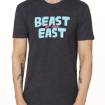 MALE MODEL WEARING A HEATHER GRAY TEE SHIRT WITH THE WORDS "BEAST OF THE EAST" IN BLUE AND PINK