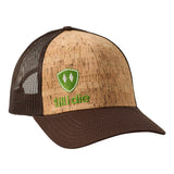 Front of a cork and brown trucker hat with a lime green till i die logo embroidered on the bottom right panel