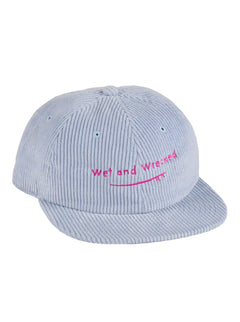 front view a the light blue corduroy surf cap on a white background, Embroidered with a hot pink surf board with 'Wet and Wrecked' text.