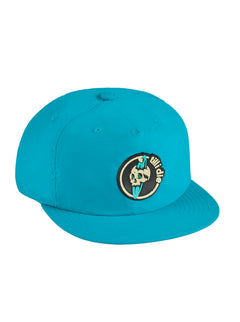 Front view of the Surf Till I Die teal-colored surf hat on a white background, featuring a black PVC patch with an off-white skull and teal surfboard, surrounded by “Till I Die” text along the border.