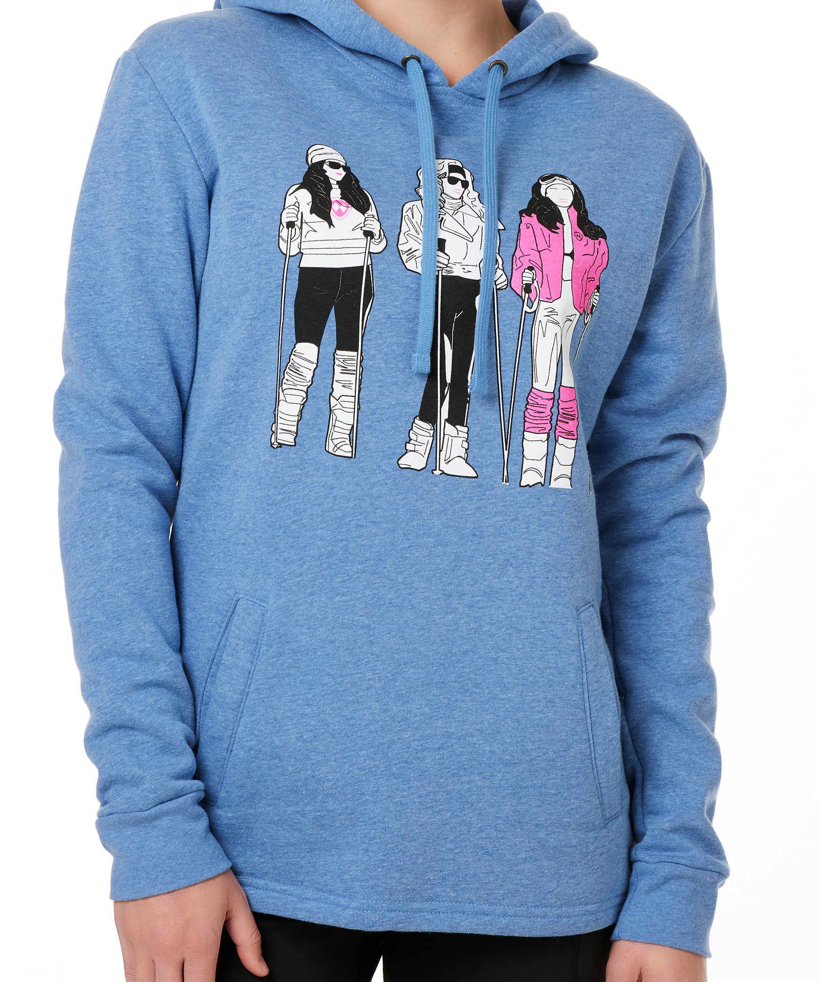 FEMALE MODEL WEARING A HEATHER BLUE HOODIE WITH A GRAPHIC OF THREE 1980S SKI LADIES 