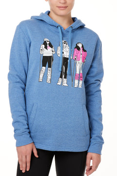 FEMALE MODEL WEARING A HEATHER BLUE HOODIE WITH A GRAPHIC OF THREE 1980S SKI LADIES 