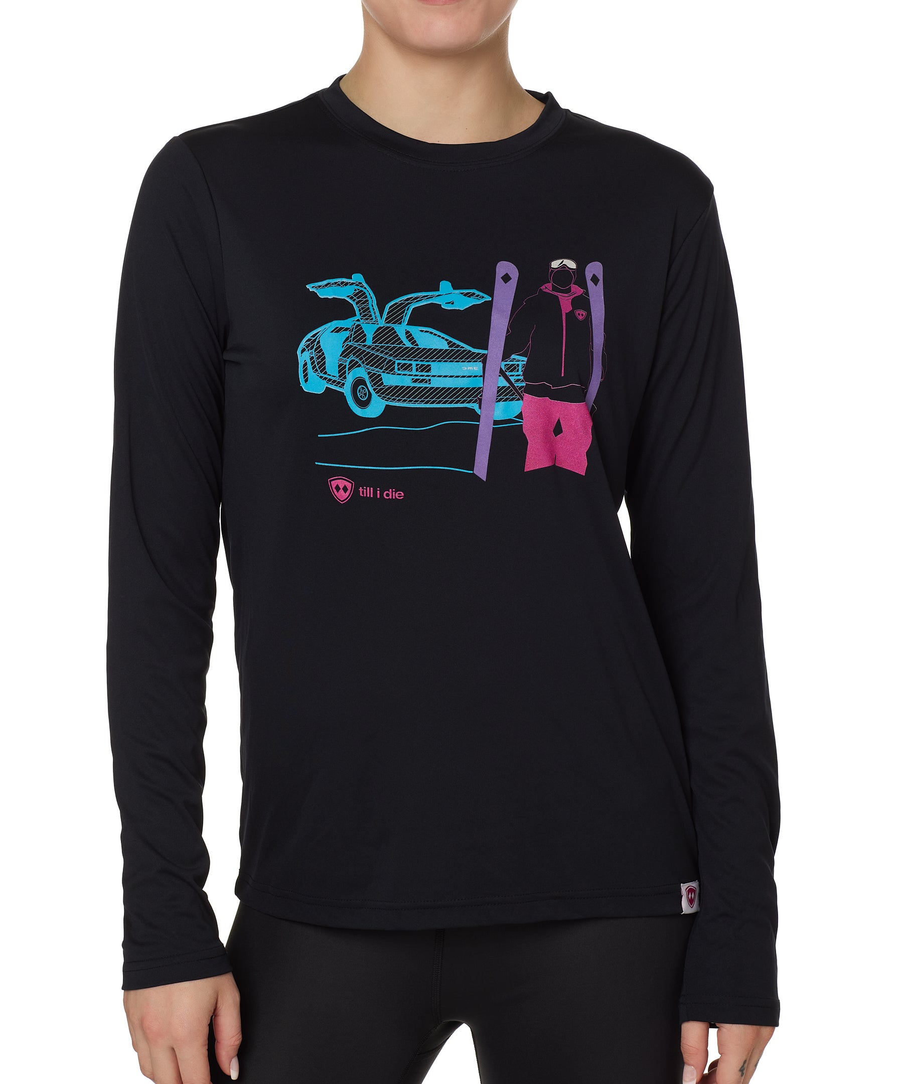 FEMALE MODEL WEARING A BLACK PERFORMANCE LONG SLEEVE SHIRT WITH A GRAPHIC OF A MULTICOLORED NEON SKIER AND DELOREAN CAR