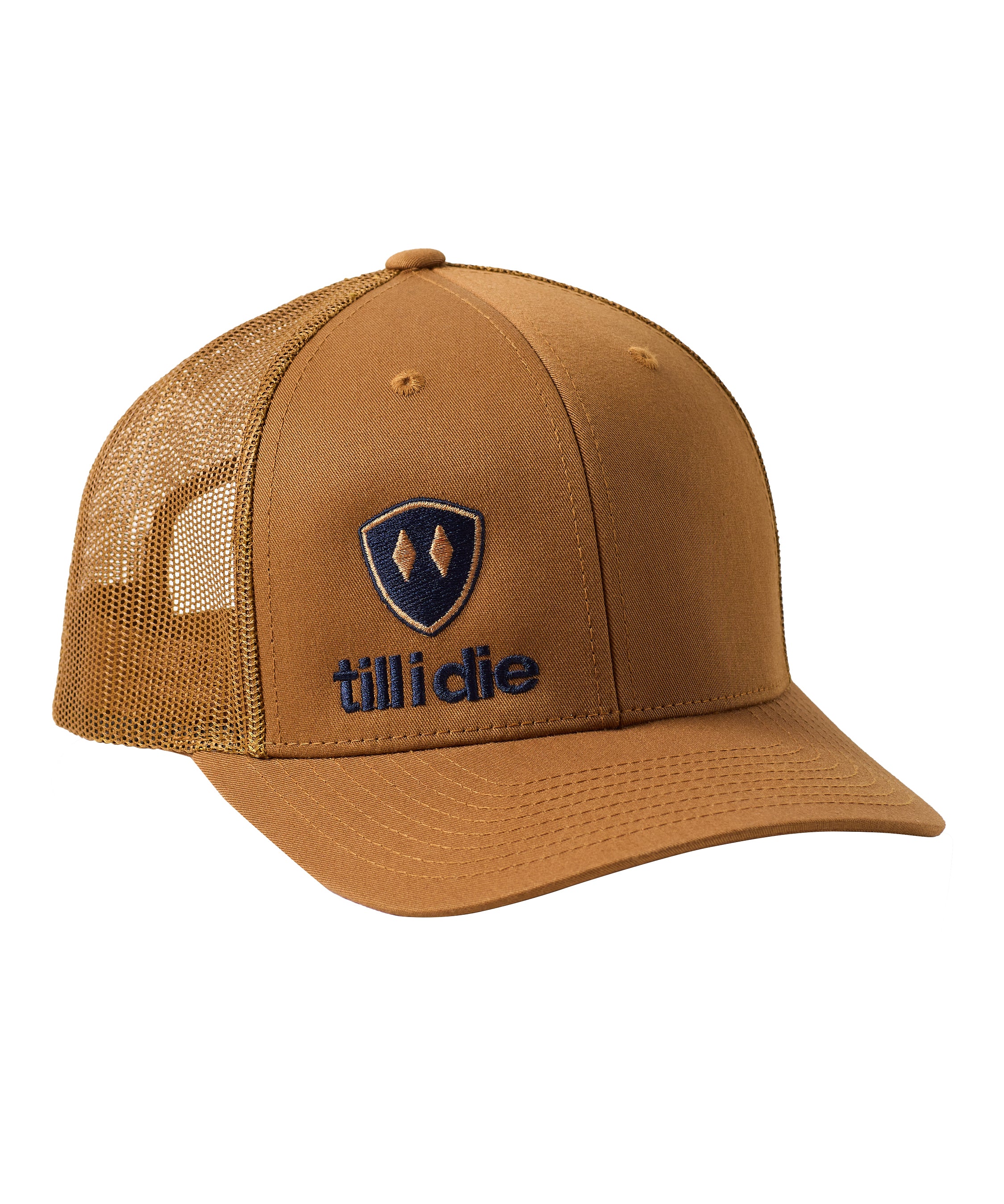 Caramel trucker hat with a navy till i die logo embroidered on the bottom right panel