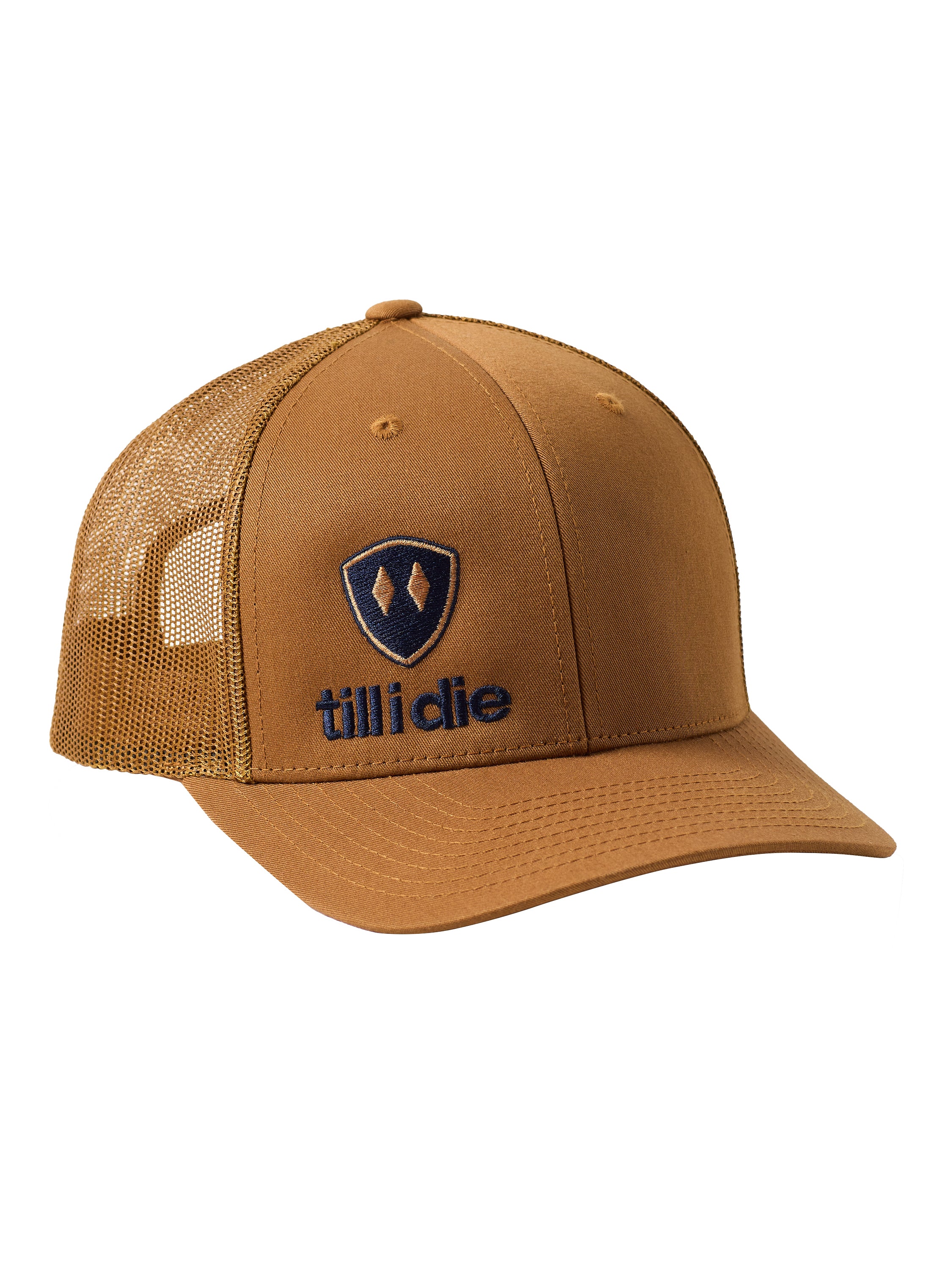 Caramel trucker hat with a navy till i die logo embroidered on the bottom right panel