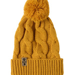 A mustard cable-knit beanie hat with a matching pom-pom on top and a ribbed cuff featuring a Till I Die Logo leather tab, shown against a plain white background.