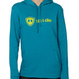 Front view of a female model wearing the Heather Teal Logo Hoodie on a white background. Features a bold bright yellow “Till I Die” logo printed across the chest, separated welt front pockets, and dyed-to-match drawstrings.