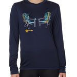 A person wearing a long sleeve navy blue shirt with a graphic of two adirondack chairs MADE OUT OF SKIS.