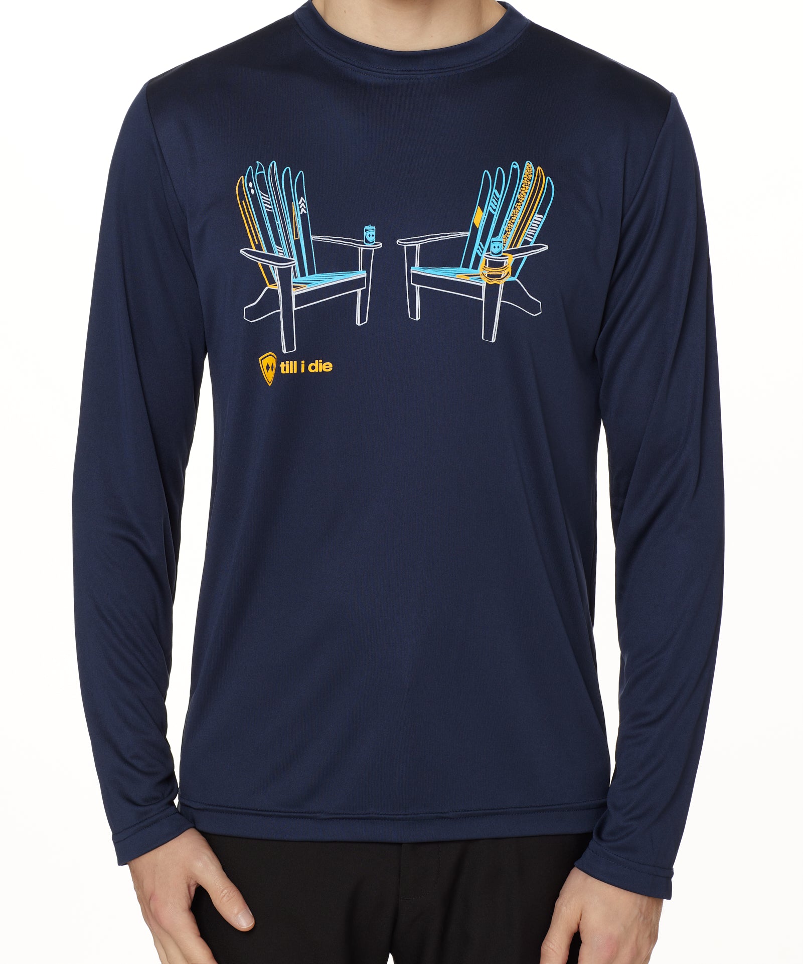 A male model wearing a long sleeve navy blue shirt with a graphic design of two ADIRONDACK chairs MADE OUT OF skis.