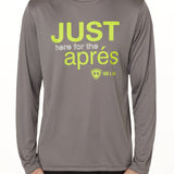 Front view of a male model wearing the Après Long Sleeve Performance Shirt in grey, displayed on a white background. The graphic features bold lime green and white text reading “Just here for the après,” with the Till I Die logo positioned below.