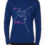 Front view of a male model wearing the Legends Yard Sale performance long sleeve shirt in blue. The graphic features a line art illustration of a skier sprawled in the snow, surrounded by scattered gear—gloves, skis, hat, and poles. Below the scene is the text: “Yard Sale – Everything Must Go.”