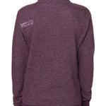 BACK OF A FEMALE MODEL WEARING A HEATHER PLUM HOODIE WITH THE WORDS "DO WHAT YOU LOVE. DO IT FOREVER." EMBROIDERED IN WHITE AND LIGHT PURPLE ON THE LEFT SHOULDER