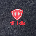 DETAIL OF A HEATHER NAVY HOODIE WITH THE TILL I DIE LOGO EMBROIDERED IN WHITE AND PINK 
