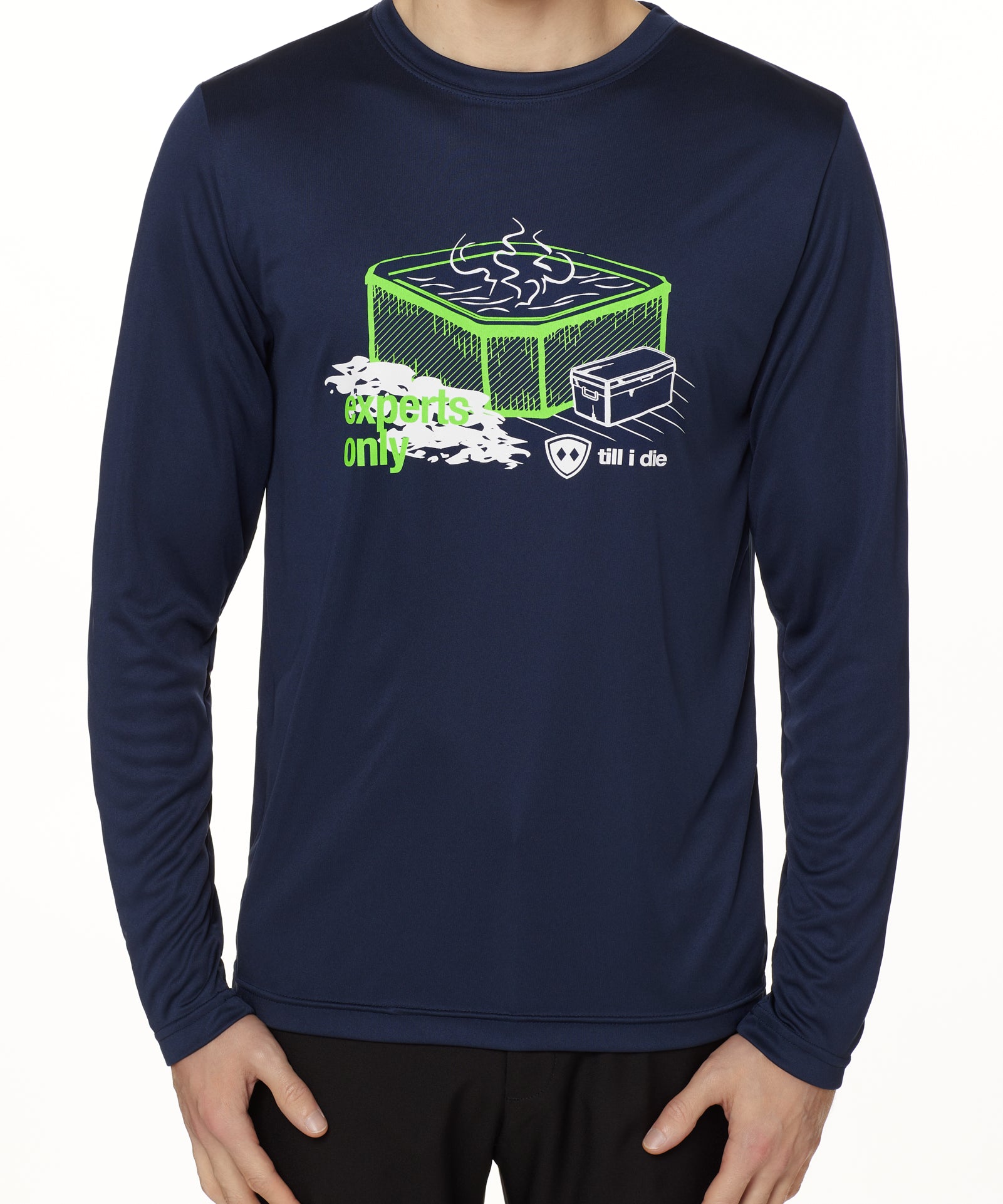 MALE MODEL WEARING A NAVY LONG SLEEVE PERFORMANCE SHIRT WITH A GRAPHIC OF A HOT TUB AND THE WORDS "EXPERTS ONLY"