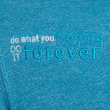 DETAIL OF A HEATHER TEAL HOODIE WITH THE WORDS "DO WHAT YOU LOVE. DO IT FOREVER." EMBROIDERED IN WHITE AND TEAL