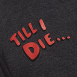 detail of red bubble letters 'till i die' on a heather slate tee