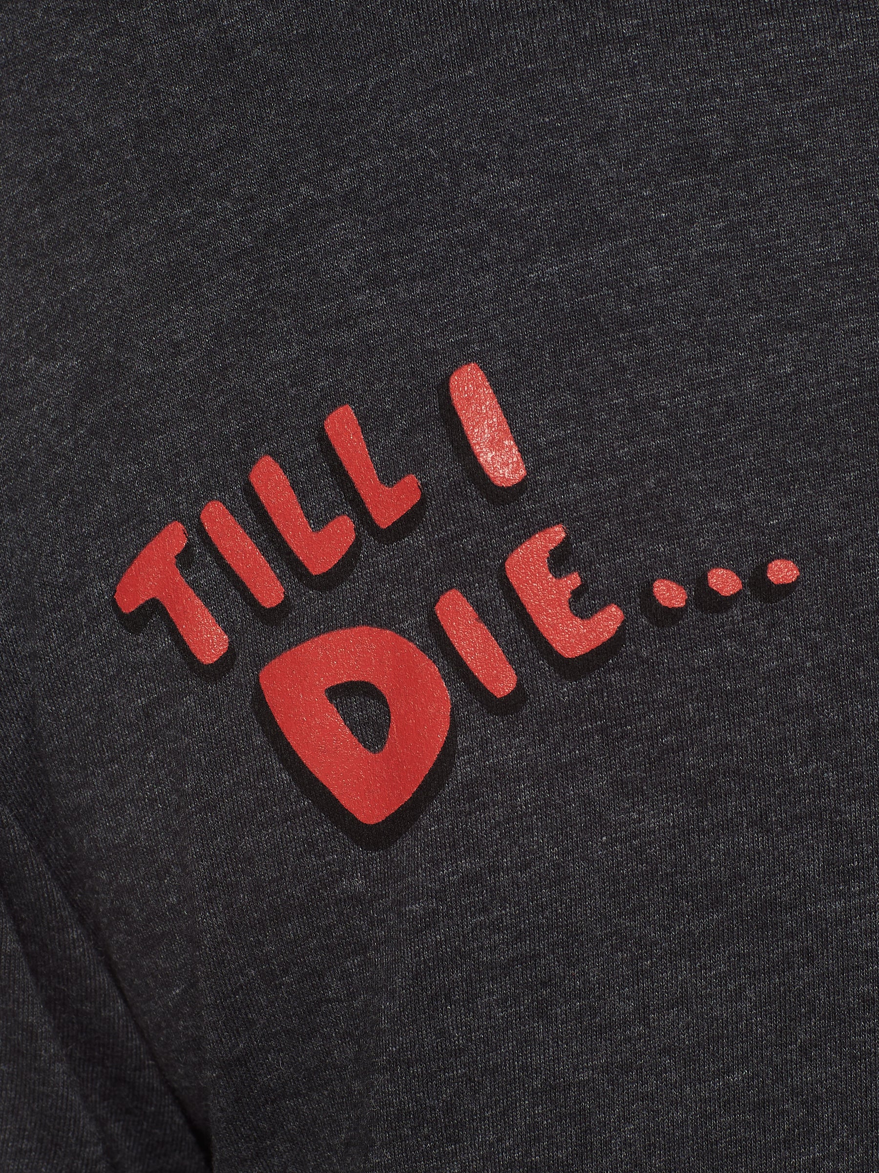 detail of red bubble letters 'till i die' on a heather slate tee