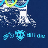 DETAIL OF A BLUE PERFORMANCE SHIRT WITH a light blue TILL I DIE LOGO AND BIKE GRAPHIC