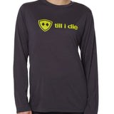 front view of a female model wearing a gray long sleeve tee with a bright yellow till i die logo across the chest