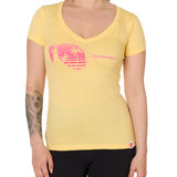 Front view of a female model wearing a short sleeve V neck Banana T-Shirt. The graphic features a pink print of sunglasses with a tropical beach scene reflected in the lenses.