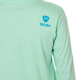 Back view of a male model wearing a Mint Green long sleeve shirt on a white background, featuring a blue Till I Die logo on the wearer’s top right shoulder.