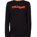 front view of a female model wearing the hot dog crew neck long sleeve tee in black. The graphic is red 'till i die' lettering inspired by the iconic title art for the 1984 ski move 'Hot Dog'