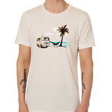 Front view of a male model wearing the Hammock crew neck tee in vintage white, displayed on a white background. The graphic depicts a vintage VW bus parked on a beach, with a surfboard leaning against it and a silhouetted figure relaxing in a hammock strung between the van and a palm tree.