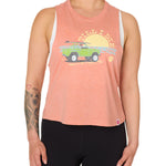 Front view of a female model wearing the Surf Truck tank in Sunset on a white background. The graphic features a classic green Bronco with a surfboard on the roof, parked in front of an ocean sunset, arched by “Till I Die” text.