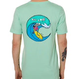 Back view of a male model wearing the Surfer Skeleton tee in mint green on a white background. The graphic features a multicolored circular graphic of a skeleton surfing a wave, with “Till I Die” text at the top.