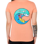 Back view of a female model wearing the Surfer Skeleton tee in citrus on a white background. The graphic features a multicolored circular graphic of a skeleton surfing a wave, with “Till I Die” text at the top.