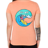 Back view of a female model wearing the Surfer Skeleton tee in citrus on a white background. The graphic features a multicolored circular graphic of a skeleton surfing a wave, with “Till I Die” text at the top.