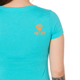 Back view of a female model wearing a Tahiti blue short sleeve shirt on a white background, featuring an orange Till I Die logo on the wearer’s top right shoulder.