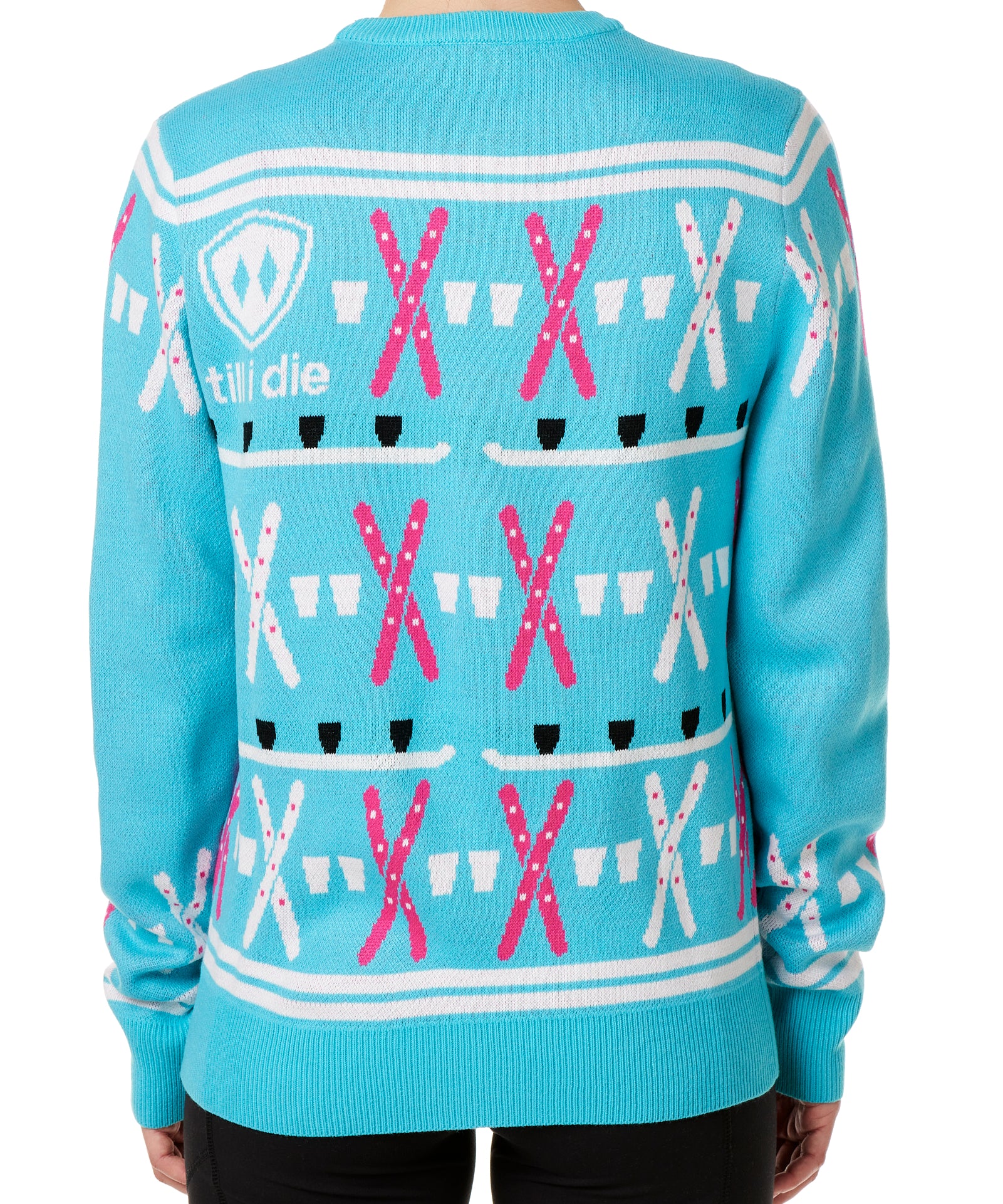 BACK OF A FEMALE MODEL WEARING A TEAL AND PINK SWEATER FEATURING SHOT SKI GRAPHICS