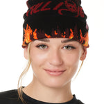 A FEMALE MODEL WEARING A BEANIE HAT WITH FLAMES AND THE WORDS "TILL I DIE"
