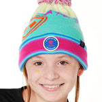 A YOUTH wearing a multicolored beanie with a pink pom-pom on top, featuring a TILL I DIE brand patch on the fold THAT SAYS "DO WHAT YOU LOVE. DO IT FOREVER."