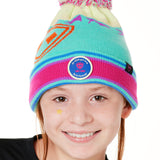 A YOUTH wearing a multicolored beanie with a pink pom-pom on top, featuring a TILL I DIE brand patch on the fold THAT SAYS "DO WHAT YOU LOVE. DO IT FOREVER."