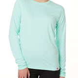 FEMALE MODEL WEARING A MINT GREEN LONG SLEEVE BASE LAYER