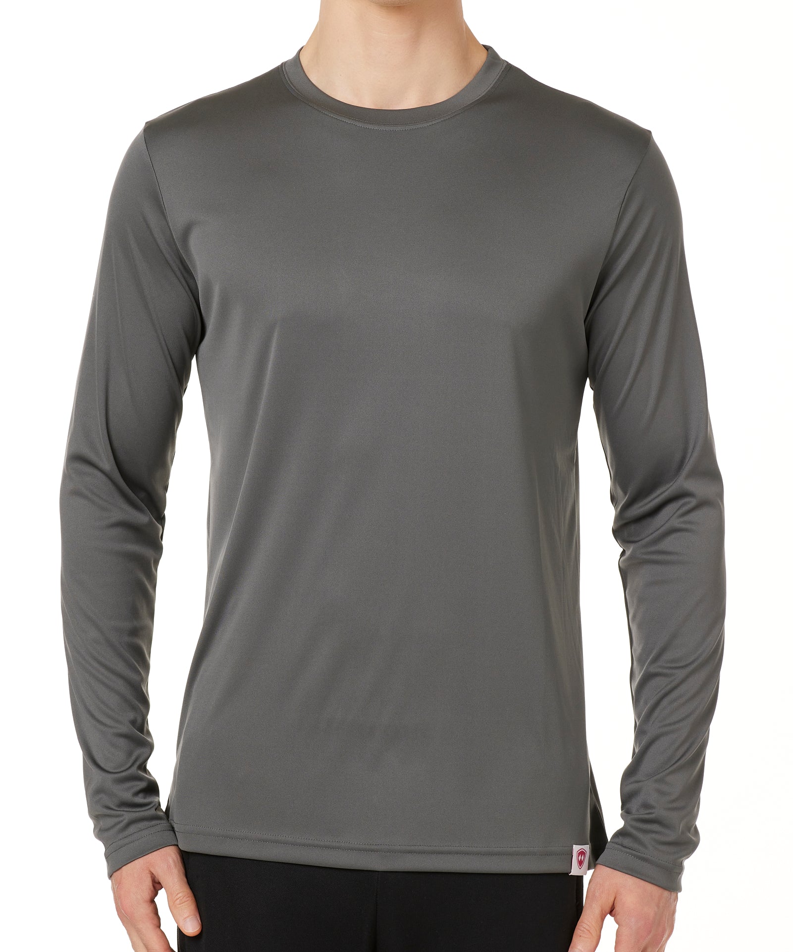 MALE MODEL WEARING A GRAY LONG SLEEVE PERFORMANCE LAYER