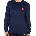 Front view of a female model wearing the Till I Die Bike performance long sleeve shirt in Navy on a white background. The shirt features a pink Double Diamond Shield logo on the wearer's left chest.