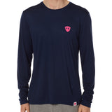 Front view of a male model wearing the Till I Die Bike performance long sleeve shirt in Navy on a white background. The shirt features a pink Double Diamond Shield logo on the wearer's left chest.