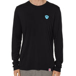 Front view of a male model wearing the Gear Head performance long sleeve tee in black on a white background. Accented with a cyan blue double diamond shield over wearers left chest.