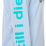 Sleeve detail of the Hammock long sleeve tee, showcasing bright teal "Till I Die" text printed along the arm.