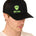 Front view of a male model wearing a black classic trucker hat, featuring a lime green embroidered Till I Die logo on the lower right front panel.
