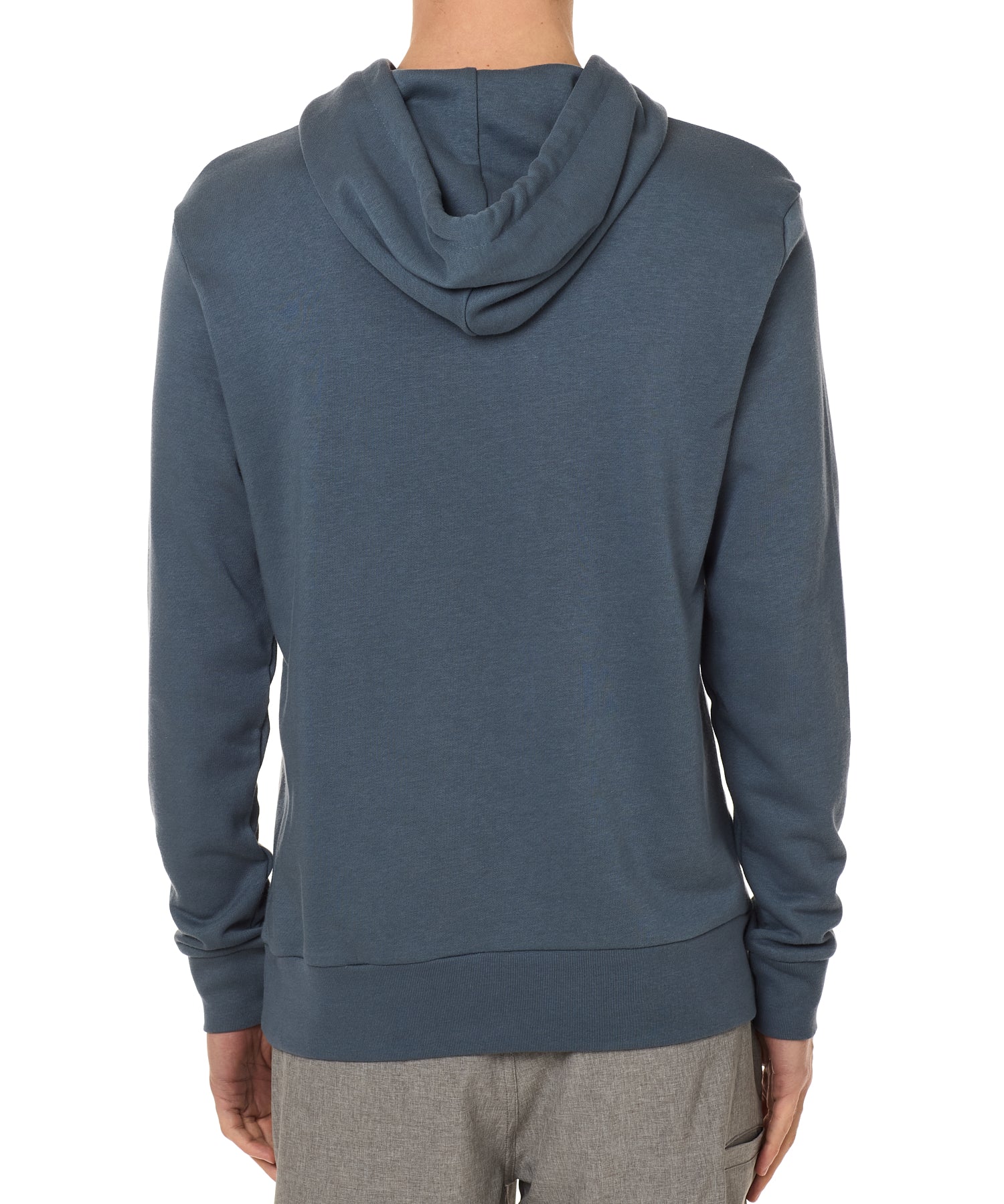 Back view of a male model wearing the Summer night hoodie in washed denim on a white background. Featuring a hood with fabric dyed to match fro a cohesive look.