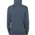 Back view of a male model wearing the Summer night hoodie in washed denim on a white background. 